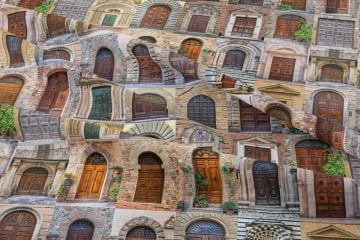 Antique Doors Patterned Digital Print Fabric on Stone Wall