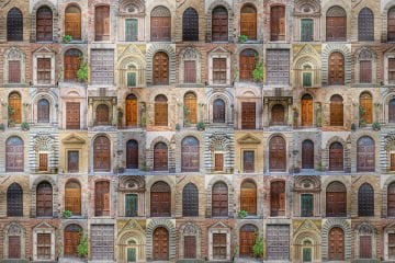 Antique Doors Patterned Digital Print Fabric on Stone Wall